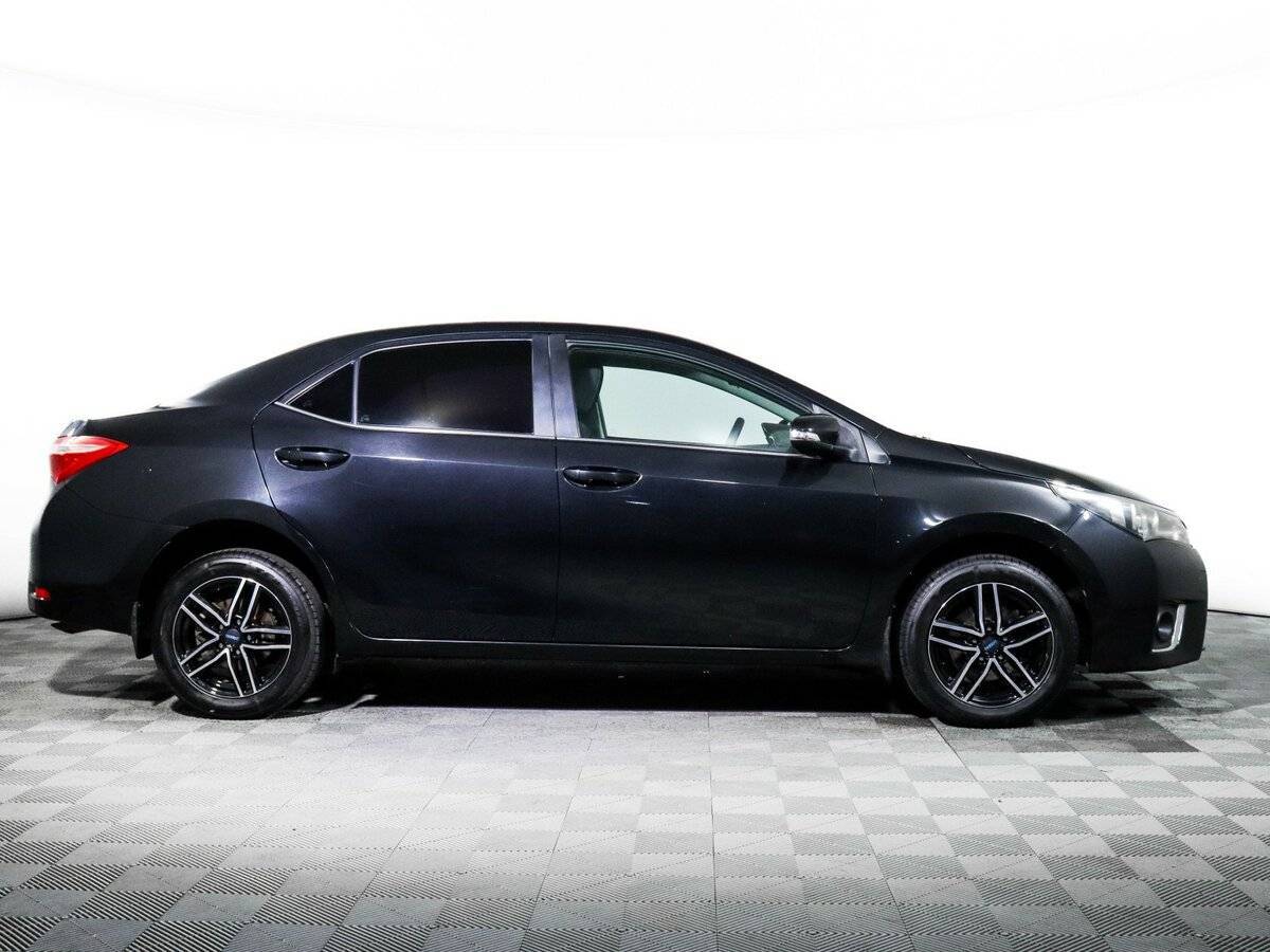 Тойота Королла б/у, 2014, Механическая. Фото: #3